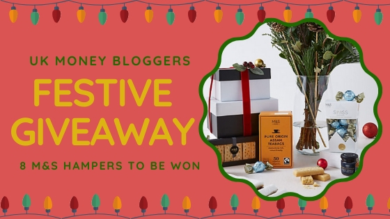 Text reads: FEstive Giveaway - win 1 of 8 hampers with a picture of some M&S hampers