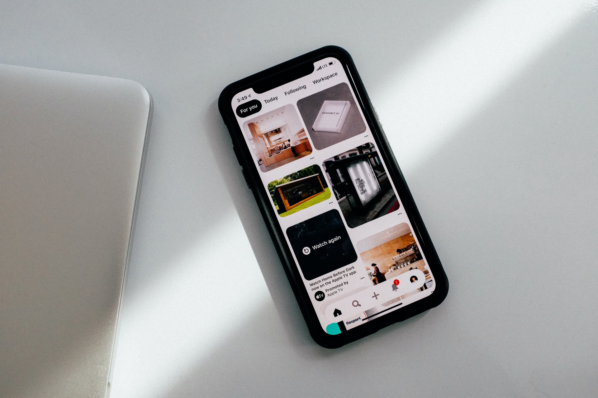 Pinterest on a smartphone on a white background
