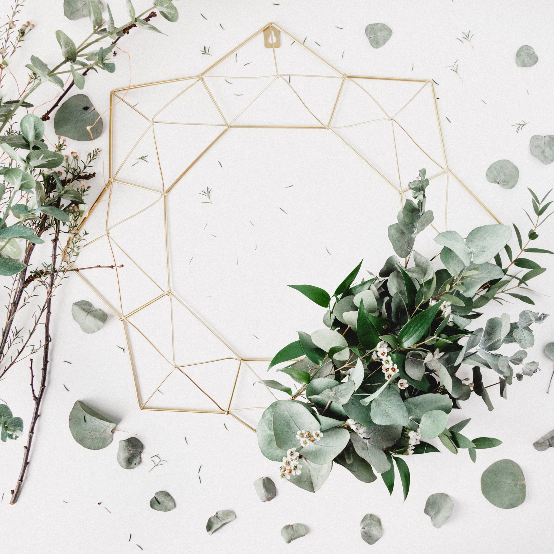 Winter blogpost ideas close up of a wreath being made with leaves and basic wiring on show