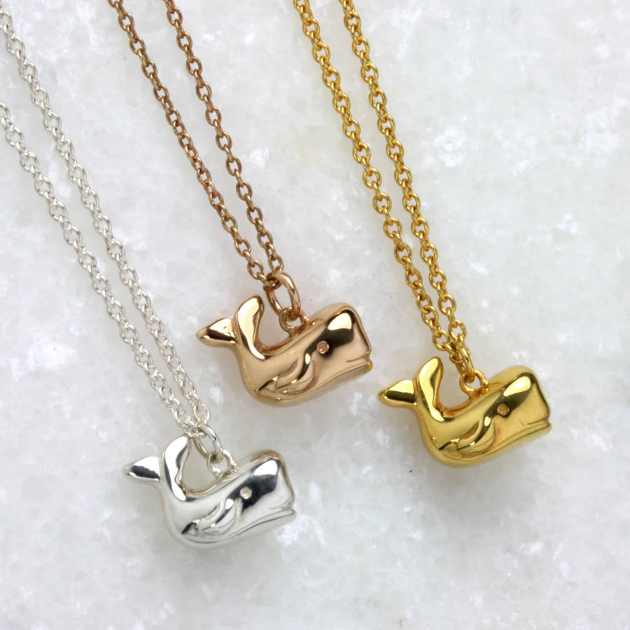 Whale necklace in a three colours in solver, gold and bronze colours on corresponding chains