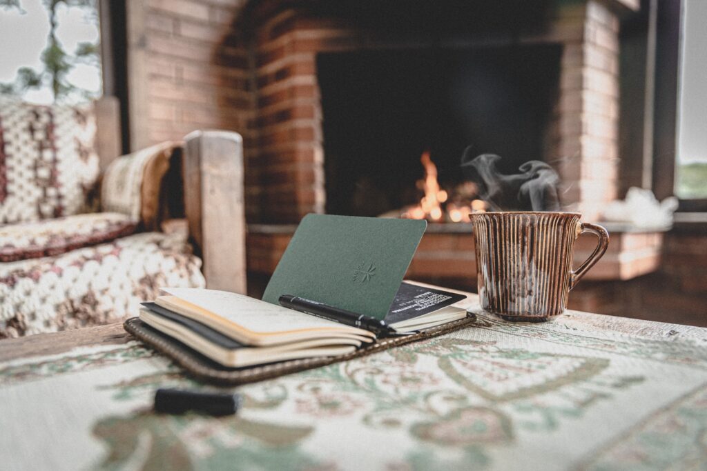 Fireplace in the background of a cosy lounge
