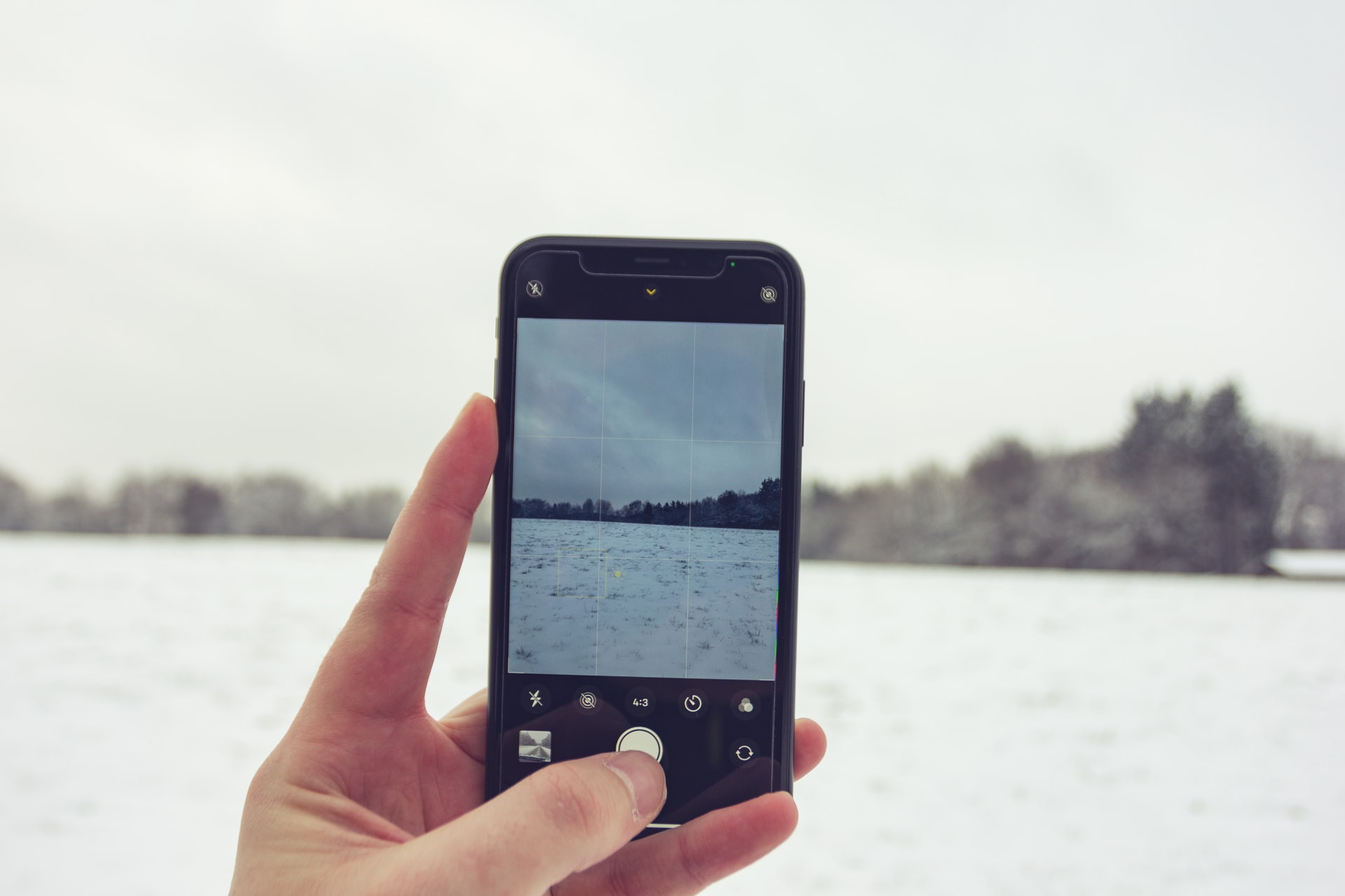 person holding old mobile phone