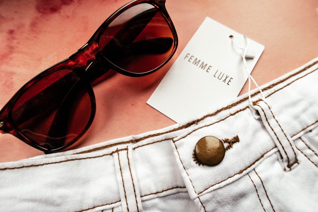 monochrome summer. White demin shorts with sunglasses in the pic