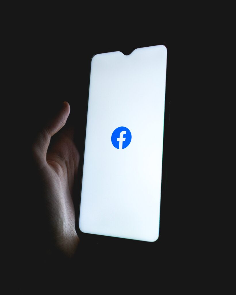 Facebook icon on a phone, going online can be free ways to entertain yourself.